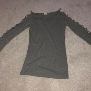 a grey, long sleeve fitted shirt